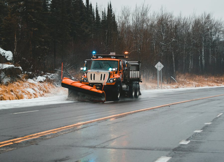 Kubota compact tractor doing municipal maintenance